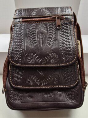 NWOT Genuine leather embossed design brown small purse 9x7x2  inches with strap